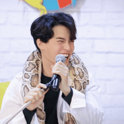 Man With Snake Holding Microphone GIF