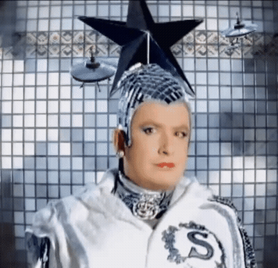 Man With Star On Helmet And S Jacket GIF