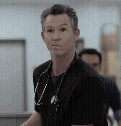 Man With Stethoscope In Black Shirt GIF