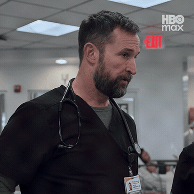 Man With Stethoscope In Front Of Exit Sign GIF
