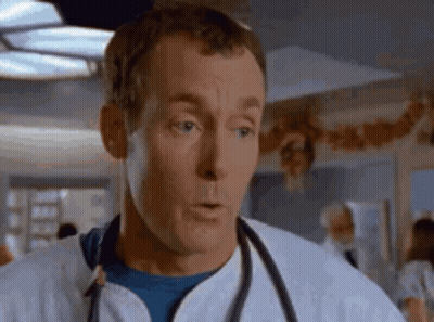 Man With Stethoscope In Hospital Room GIF