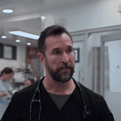 Man With Stethoscope Looking At Camera GIF