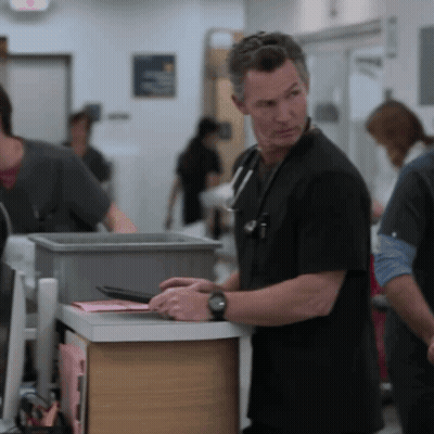 Man With Stethoscope Standing Next To Another Man GIF