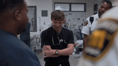 Man With Stethoscope Talking In Ambulance GIF