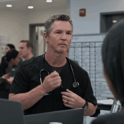Man With Stethoscope Talking To Another Man GIF