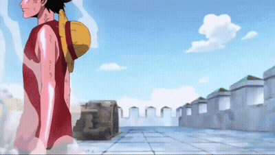 Man With Straw Hat Walking Down Sidewalk GIF