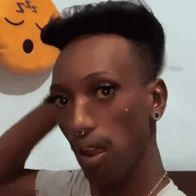 Man With Stuffed Face On Head GIF