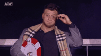 Man With Suit And Scarf Holding AEW Life Preserver GIF
