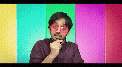 Man With Sunglasses And Beard Talking Into Microphone GIF