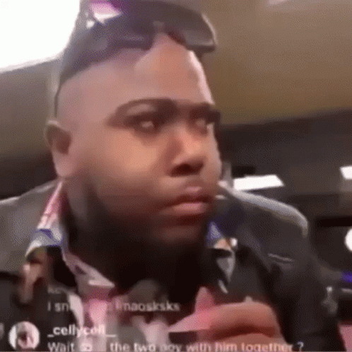Man With Sunglasses And Bow Tie In Car GIF