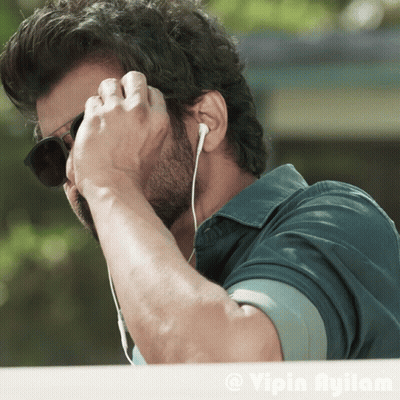 Man With Sunglasses And Ear Buds Vipin Ayilam GIF