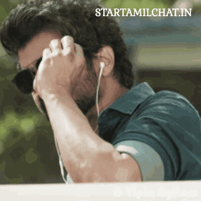 Man With Sunglasses And Earbuds On Phone Starttamilchat.in GIF