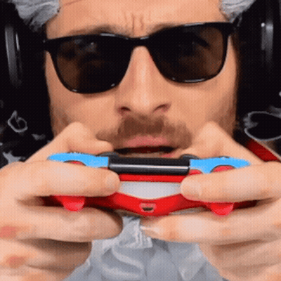 Man With Sunglasses And Headphones Holding Video Game Controller GIF