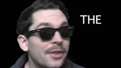Man With Sunglasses And Mustache Making A Face GIF