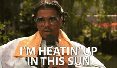 Man With Sunglasses And Towel Saying I'm Heatin Up GIF