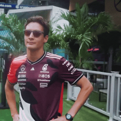 Man With Sunglasses And UBS Shirt GIF