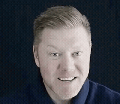 Man With Sunglasses And Yellow Shirt In Car GIF