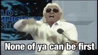 Man With Sunglasses Holding Microphone Saying None Of Ya Can Be First GIF