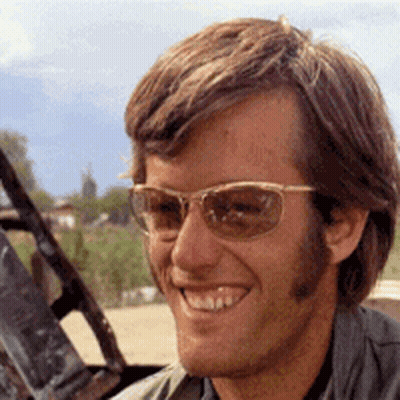 Man With Sunglasses Smiling In Car GIF