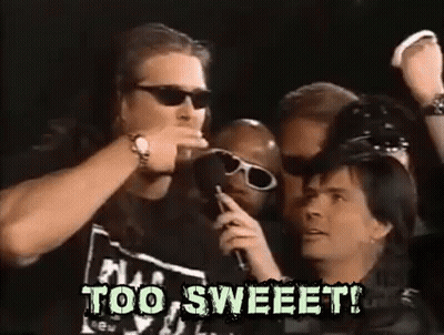 Man with Sunglasses Talking Into Microphone