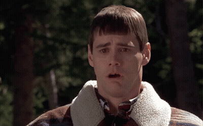 Man With Surprised Look In Plaid Jacket GIF
