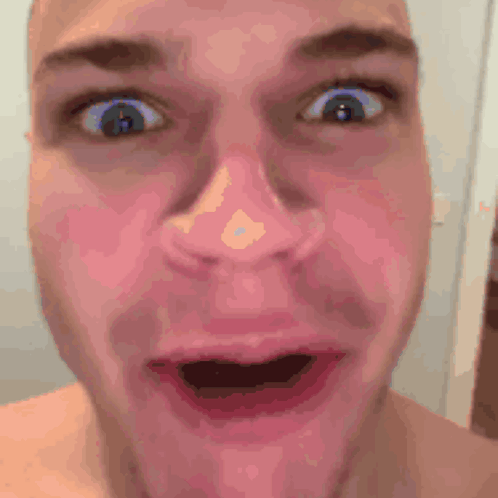 Man With Surprised Open Mouth GIF
