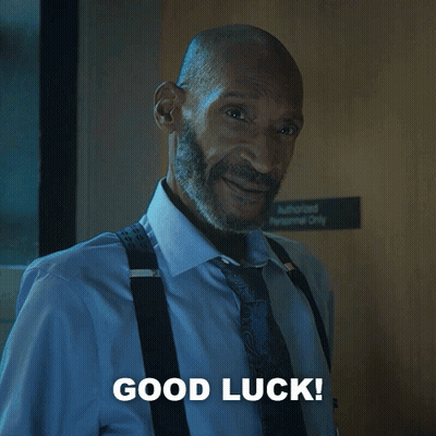Man With Suspenders And Beard Saying Good Luck GIF