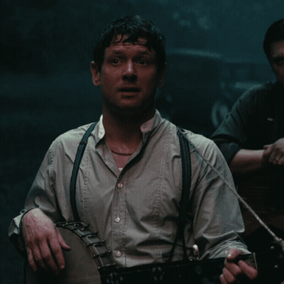 Man With Suspenders And Ring Smiling GIF