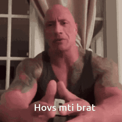 Man With Tattoo Giving Thumbs Up Says Hovs Mti Brat GIF