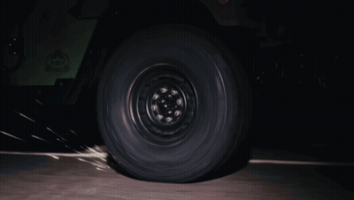 Man With Tattoo On Arm In Black Mask GIF
