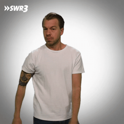 Man With Tattoo On Arm In White T-Shirt GIF