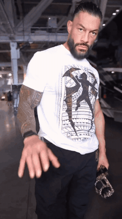 Man With Tattoo Saying A GIF