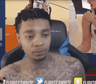 Man With Tattoo Sitting In Front Of Flight 23 White Screen GIF