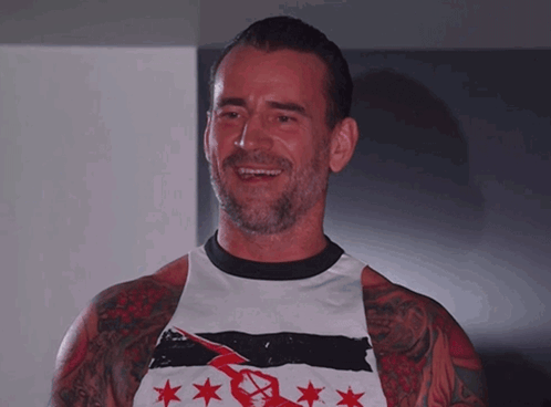 Man With Tattoo Wearing CT Shirt GIF