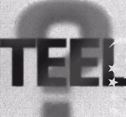 Man With Teel Word In Foreground GIF