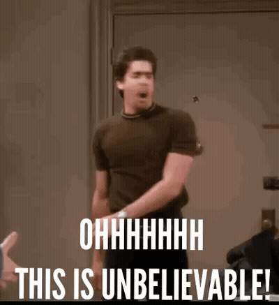 Man With This Is Unbelievable On Face Standing Before Door GIF
