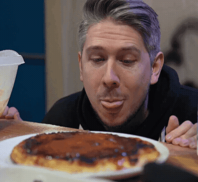 Man With Tongue Out Looking At Food GIF