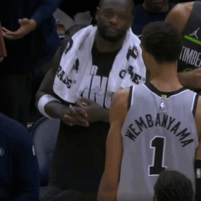 Man With Towel And Number 1 Jersey GIF