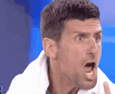 Man With Towel Around Neck Making Funny Face GIF