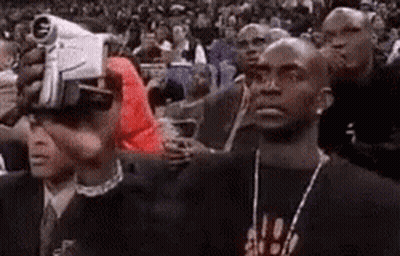 Man With Towel At Microphone In Boxing Ring GIF