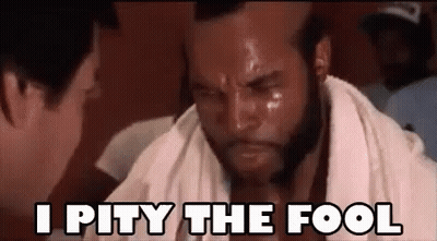 Man With Towel Says I Pity The Fool To Another Man GIF