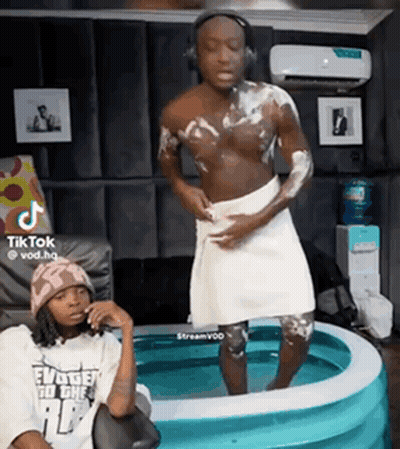 Man With Towel Standing In Pool GIF