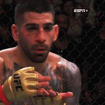 Man With UFC Gloves In Boxing Ring GIF