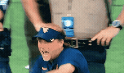 Man With W Visor Held By Police Officer GIF
