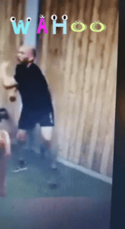 Man With Wahoo On Screen GIF