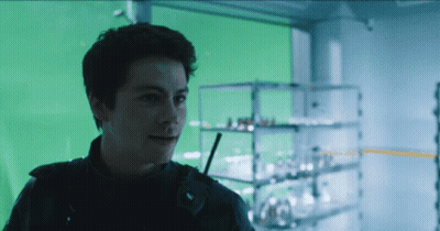 Man With Walkie Talkie In Front Of Green Screen GIF