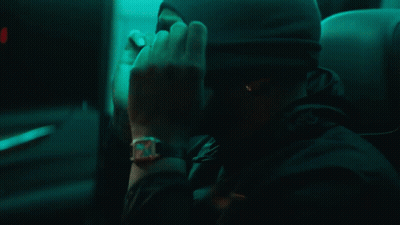 Man With Watch Covering Face GIF