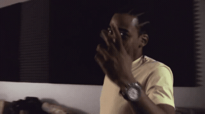 Man With Watch Covering Face GIF