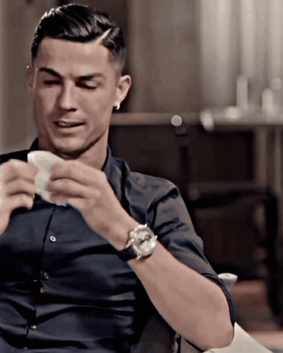 Man With Watch Holding Paper GIF