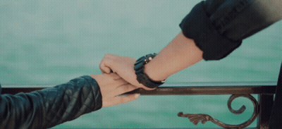 Man With Watch Holding Woman's Hand GIF